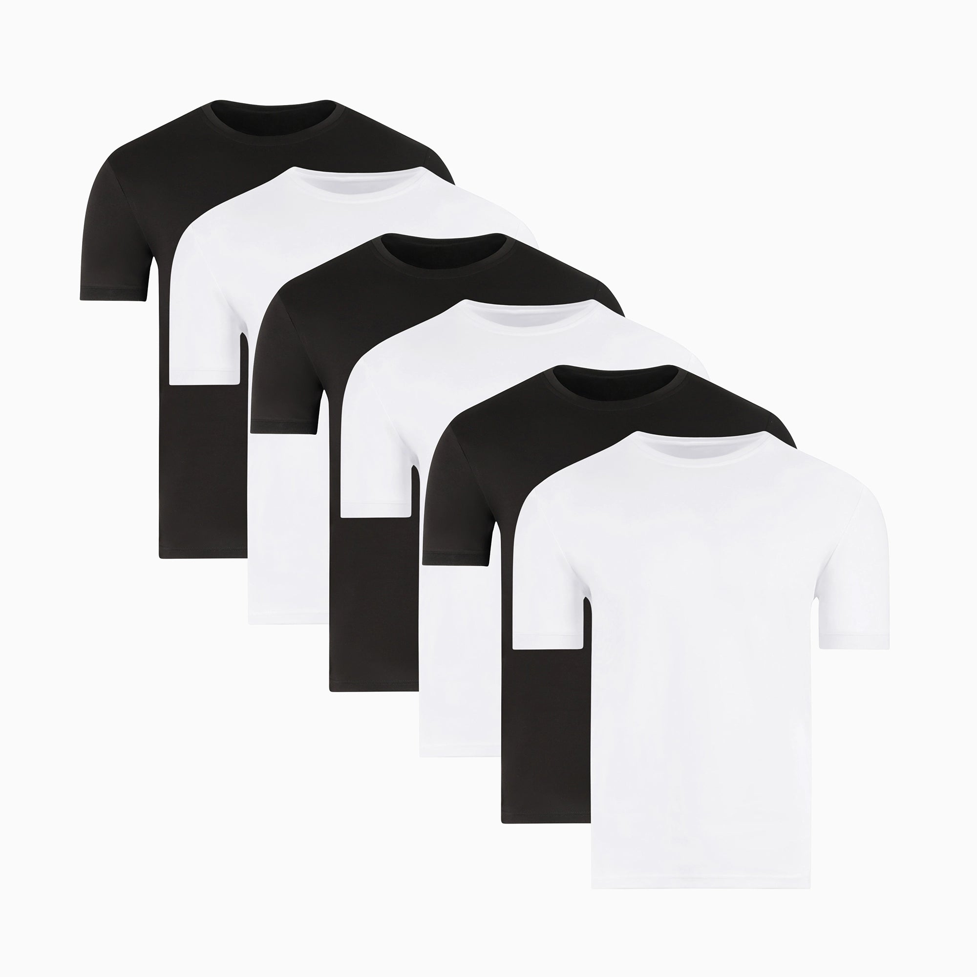 Five plain t-shirts in black, white, navy, and gray.
